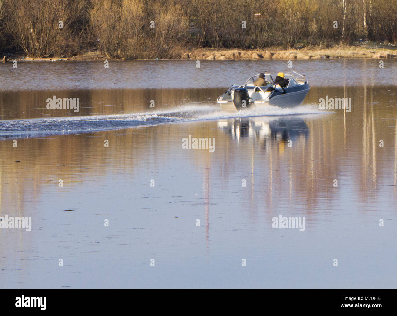 Boy fishing in boat couple hi-res stock photography and images - Alamy