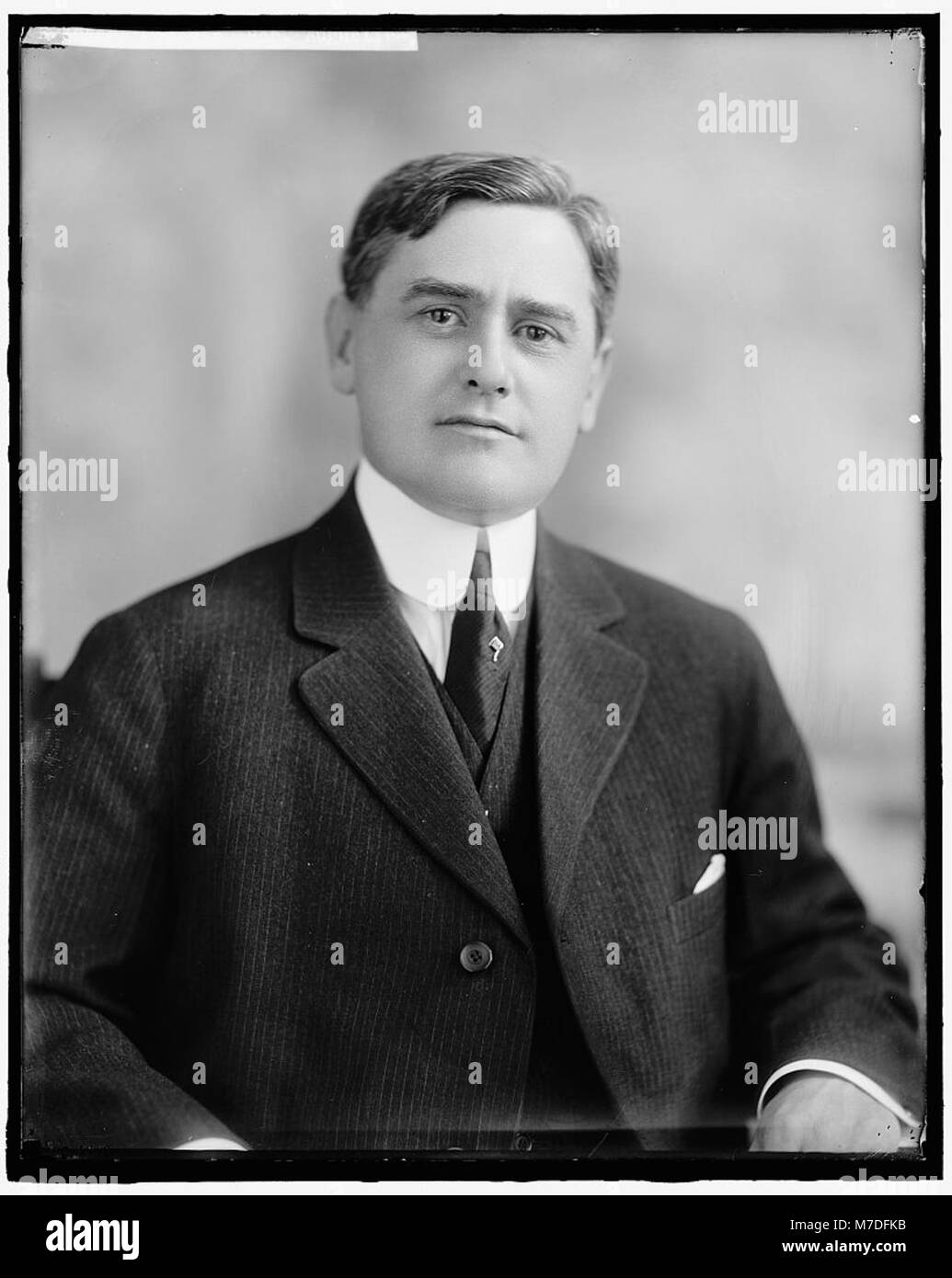 A formal portrait of Augustine Lonergan, capturing his dignified ...