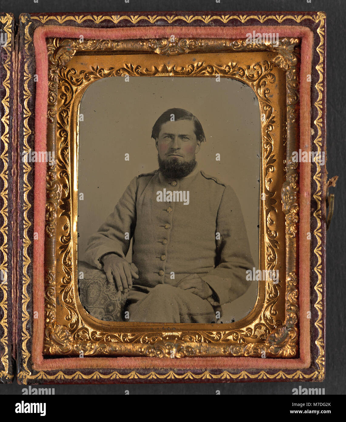 A photograph of an unidentified soldier in Confederate uniform. This ...