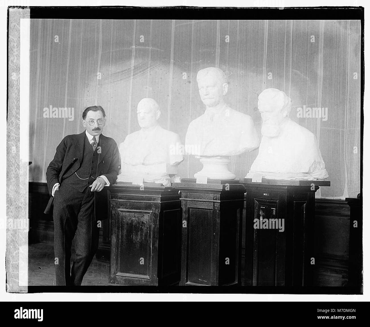 Moses Wainer Dykaar and bust of Marshall, Clark, & Maxim