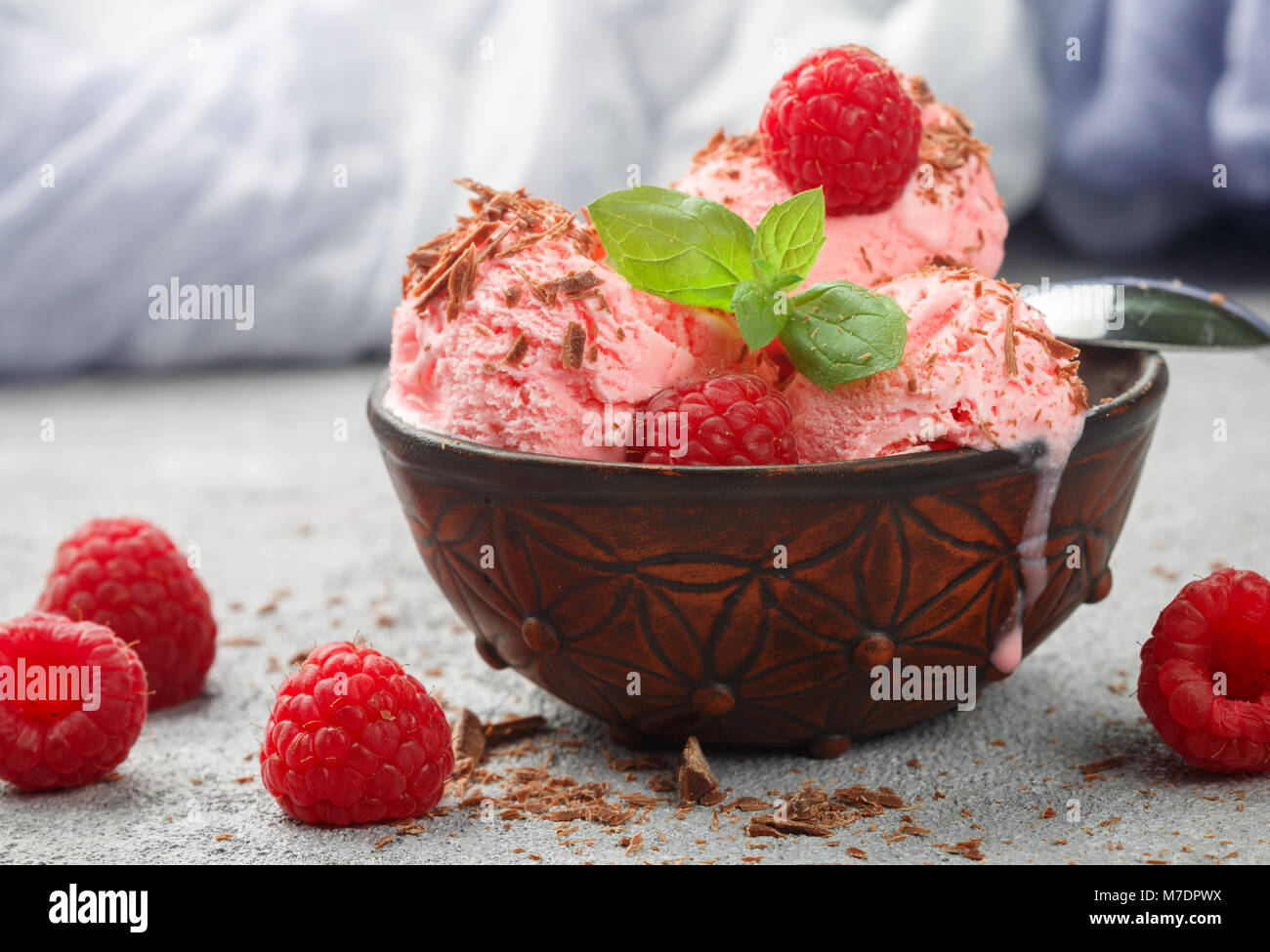Homemade raspberry ice cream with chocolate and mint. A refreshing ...