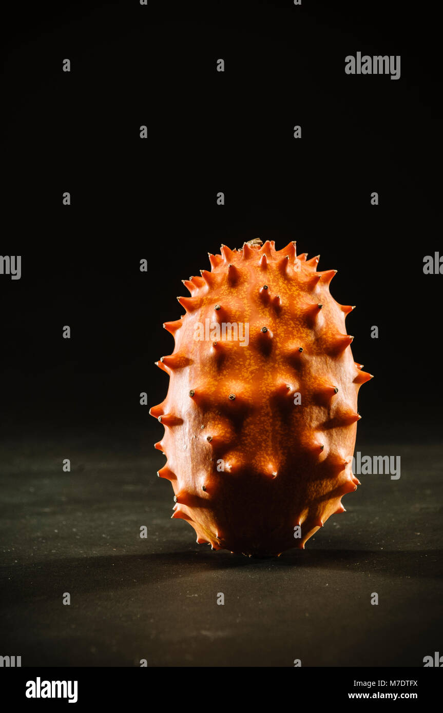 close up of exotic fruit on dark, black background Stock Photo