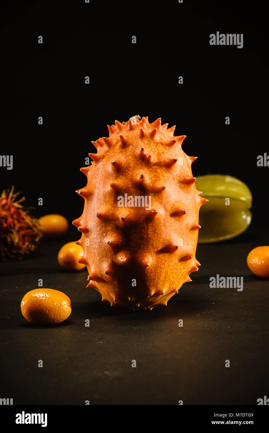 close up of exotic fruit on dark, black background Stock Photo