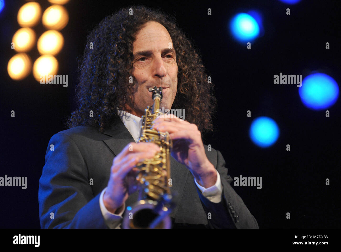 NEW YORK, NY - JANUARY 14: Saxophonist Kenny G performs outside Hard Rock Cafe, Times Square on January 14, 2014 in New York City  People:  Kenny G Stock Photo