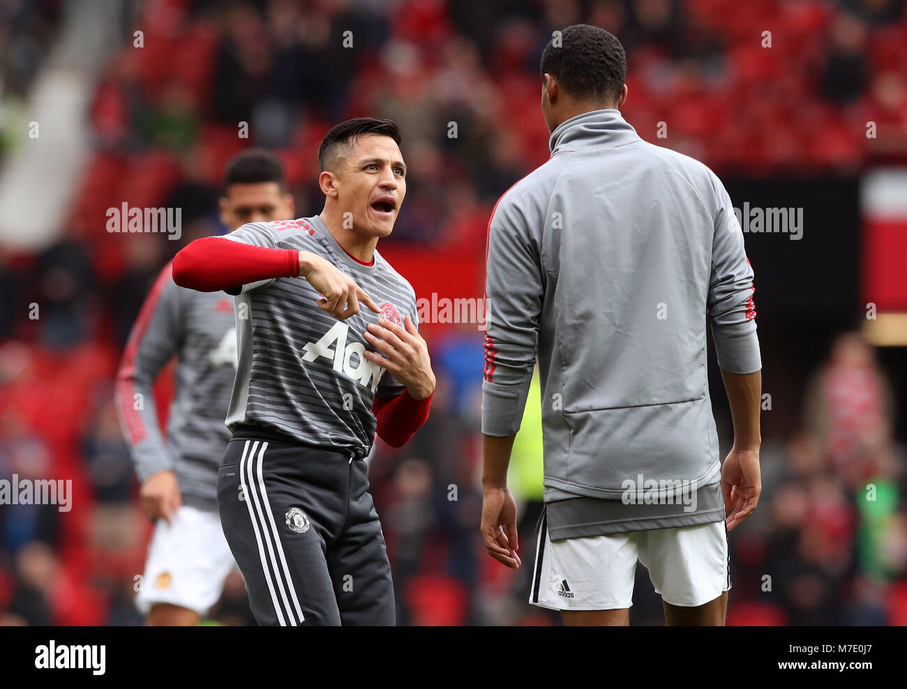 Manchester United's Alexis Sanchez speaks with Marcus Rashford before ...