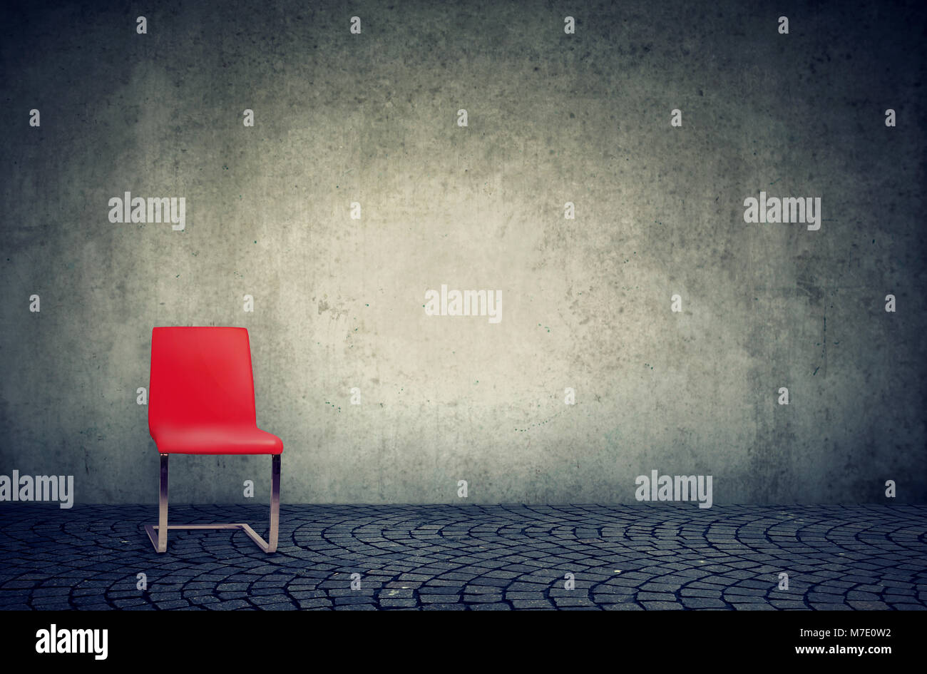 Red chair in minimalist loft style empty office. Concept of minimalism. Stock Photo