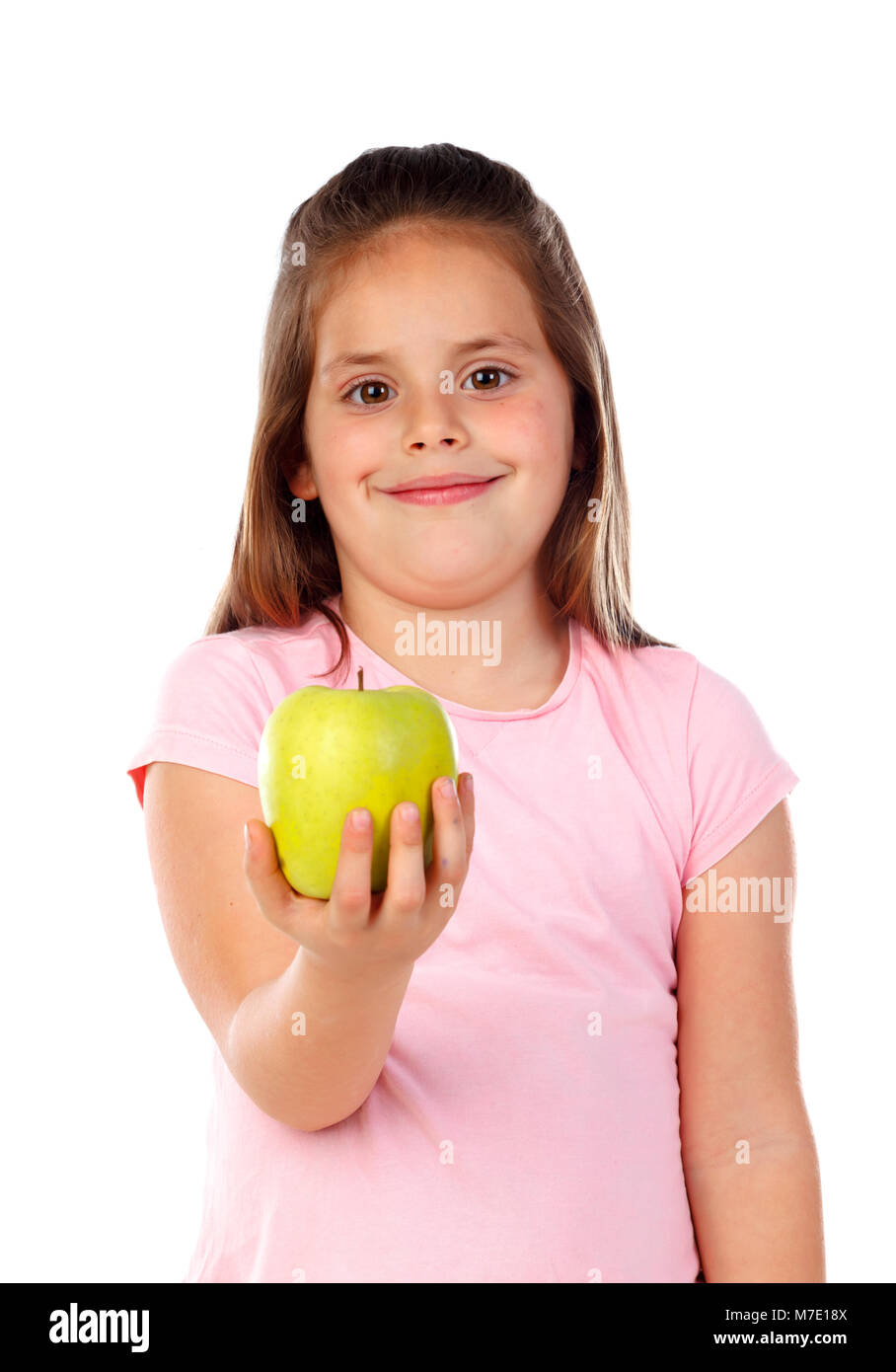 Girl with a yellow apple isolated on a white background Stock Photo