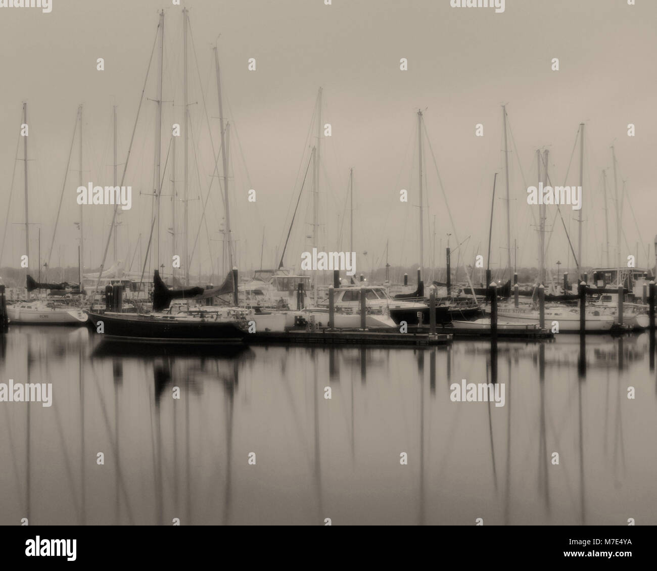 Sailboats docked during a foggy morning in historic Newport, Rhode Island, USA Stock Photo
