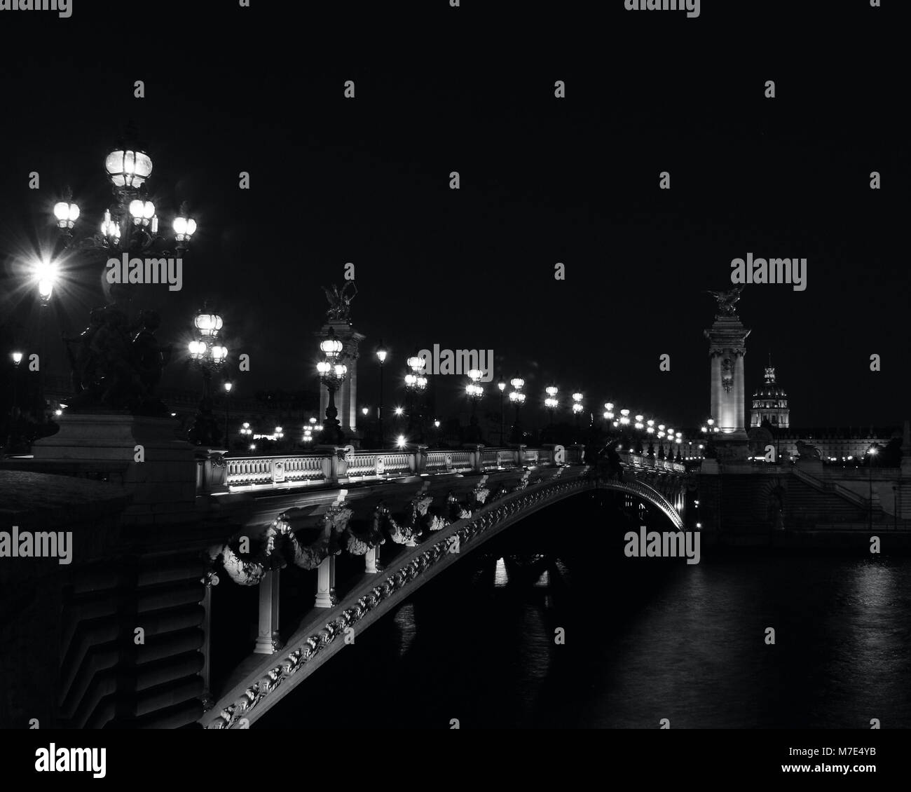 Bridge in Paris, France at Night, in Black and White Stock Photo
