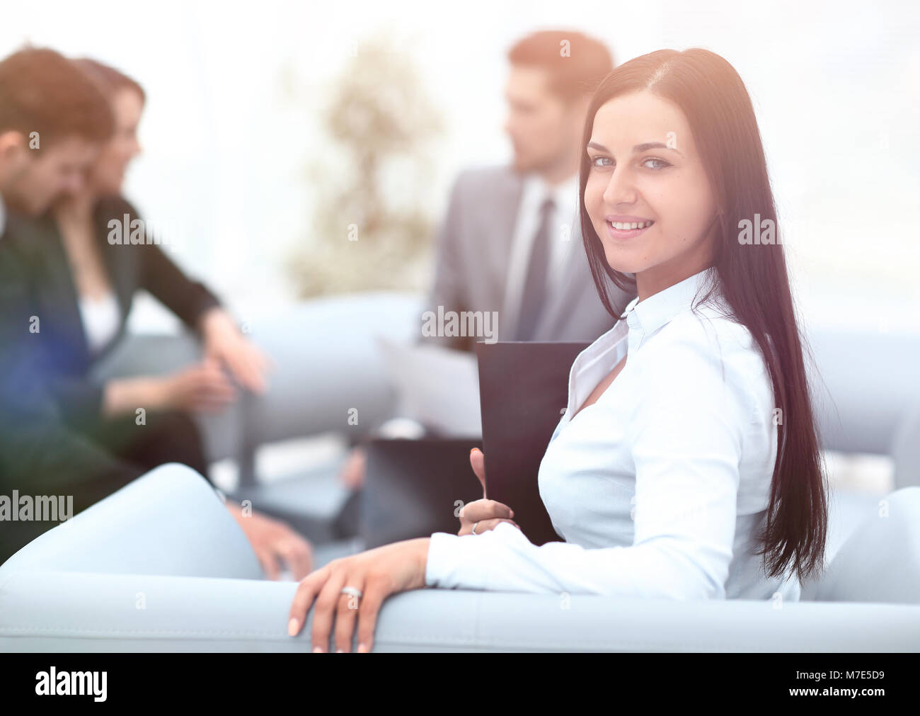 young business woman sitting in office at background business te Stock ...