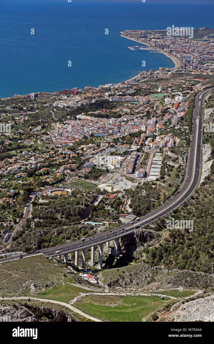 The AP-7 autopista highway snakes past Benalmadena on the Costa del Sol, Spain. Stock Photo