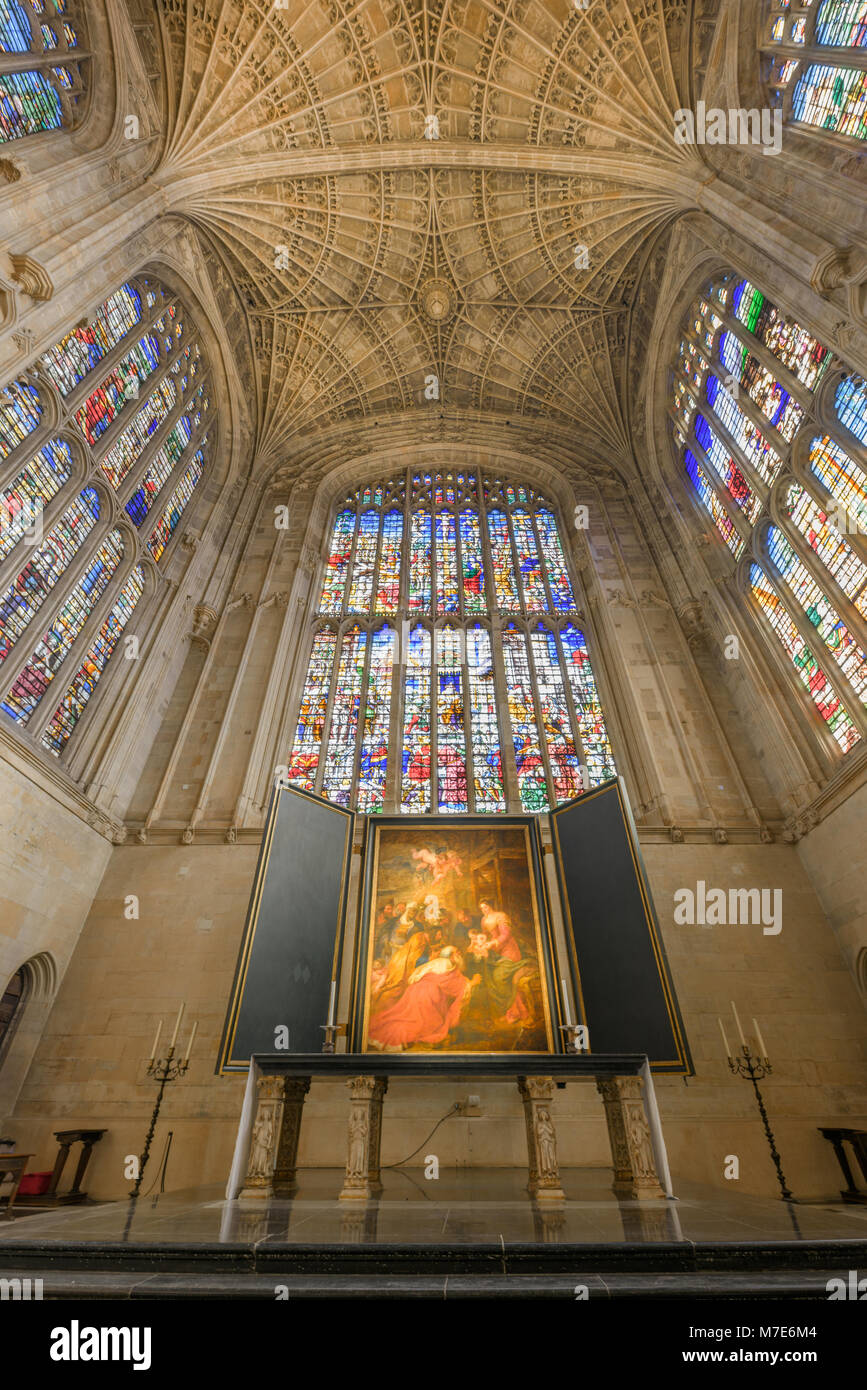 The choir with its floor, stained glass windows, fan ceiling, altar, and painting by Rubens in the chapel at King's college, university of Cambridge, Stock Photo
