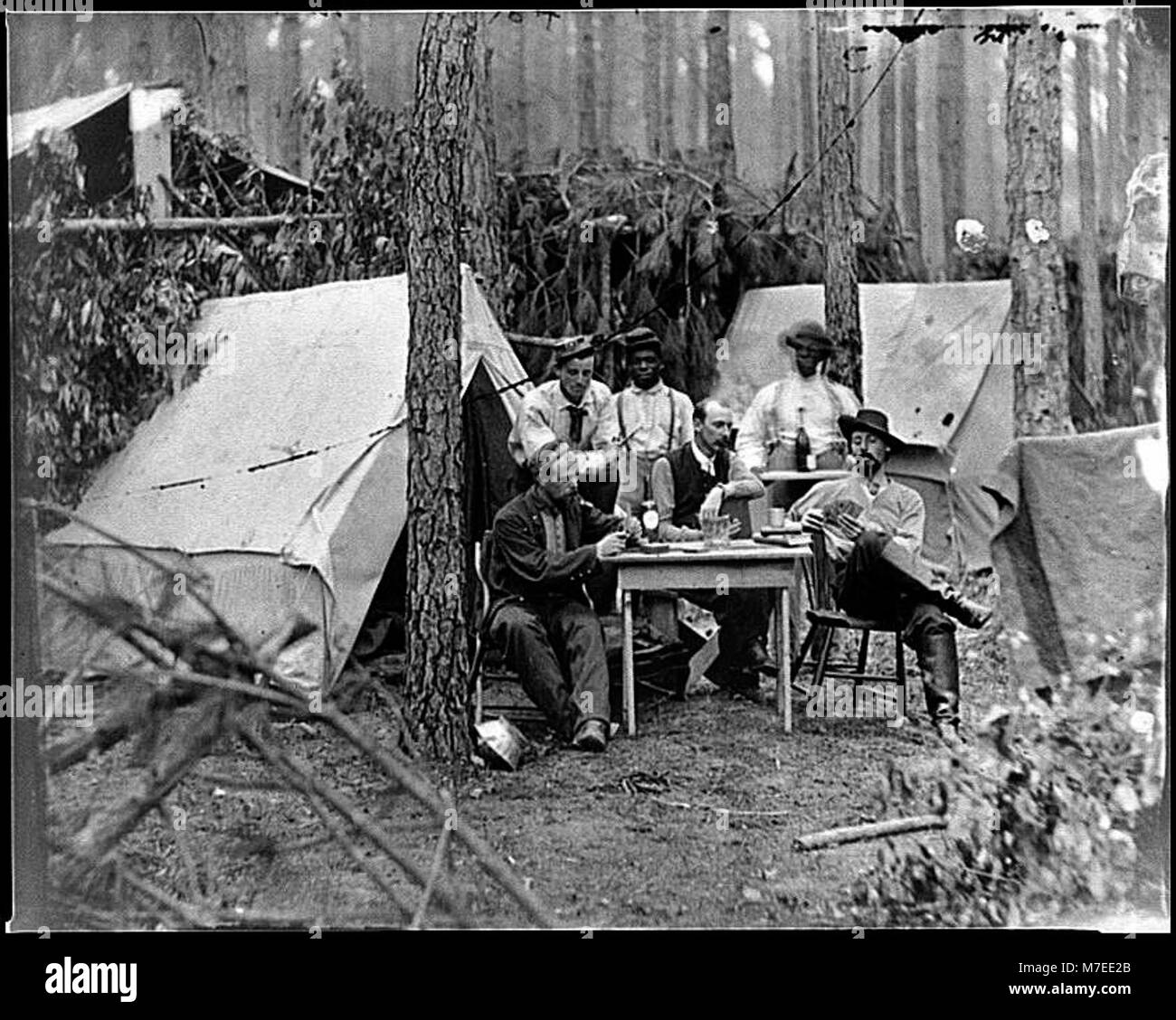 Petersburg, Va. Officers of the 114th Pennsylvania Infantry playing cards in front of tents LOC cwpb.03882 Stock Photo