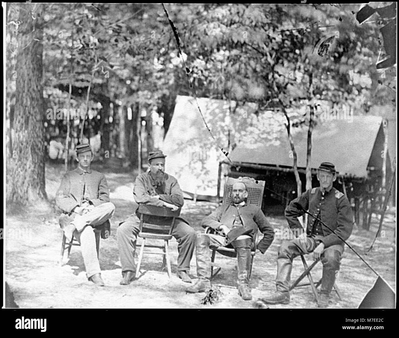 This photograph shows the officers of the 1st Massachusetts Cavalry at the Army of the Potomac headquarters during the American Civil War. It offers a glimpse into the military organization and leadership of Union forces in Virginia. Stock Photo