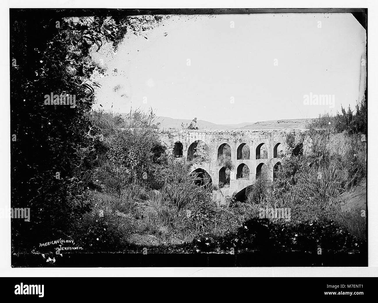 This image showcases the ancient aqueduct at 'Ain Duke, part of the ...