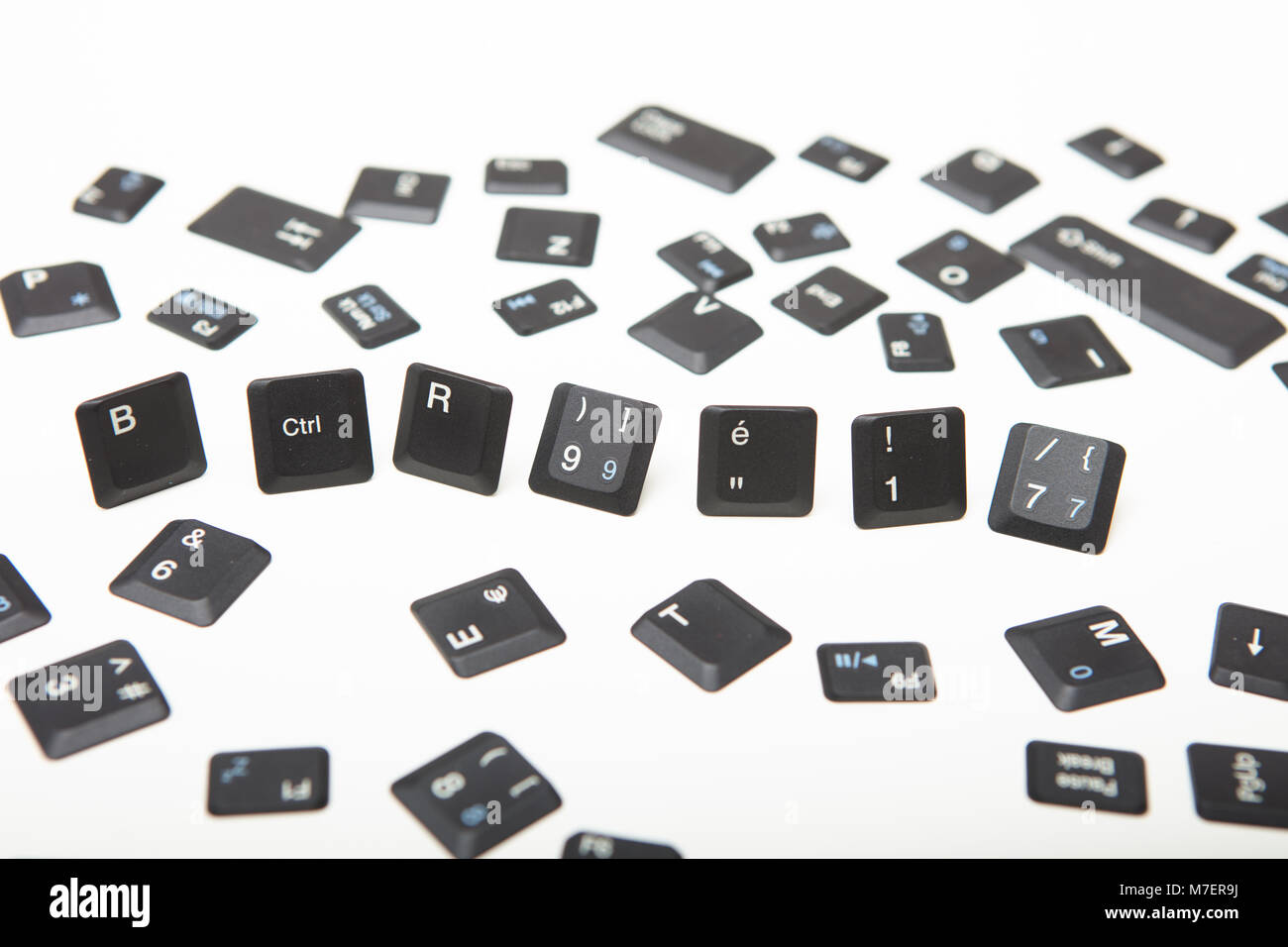 Computer keyboard composed of loose key covers from a computer with the