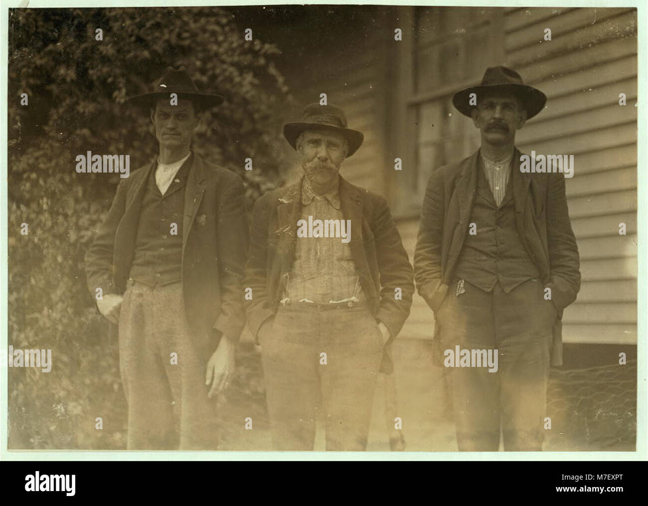 Some of the operatives, Dickson Mills, Laurinburg, N.C. Dec. 6, 1908. Witness, Sara R. Hine. LOC nclc.01510 Stock Photo