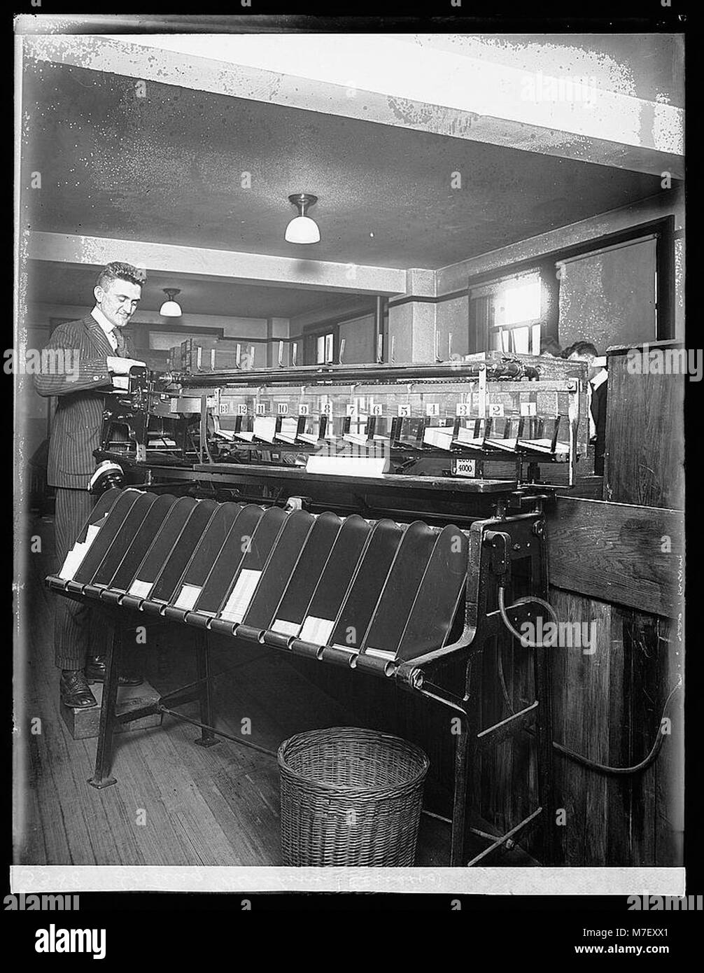 A photograph of a sorting machine used during the U.S. Census, likely ...