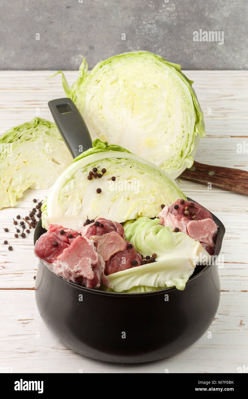 Cooking the traditional Norwegian dish of braised cabbage with lamb ...