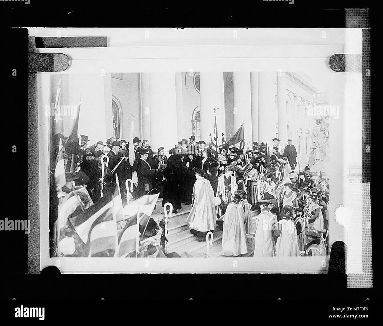 This photograph captures suffragettes gathered outside the U.S. Capitol ...