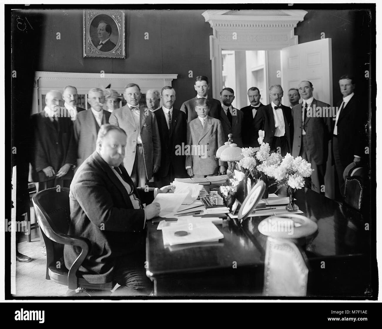 This photograph captures President William Howard Taft signing the ...