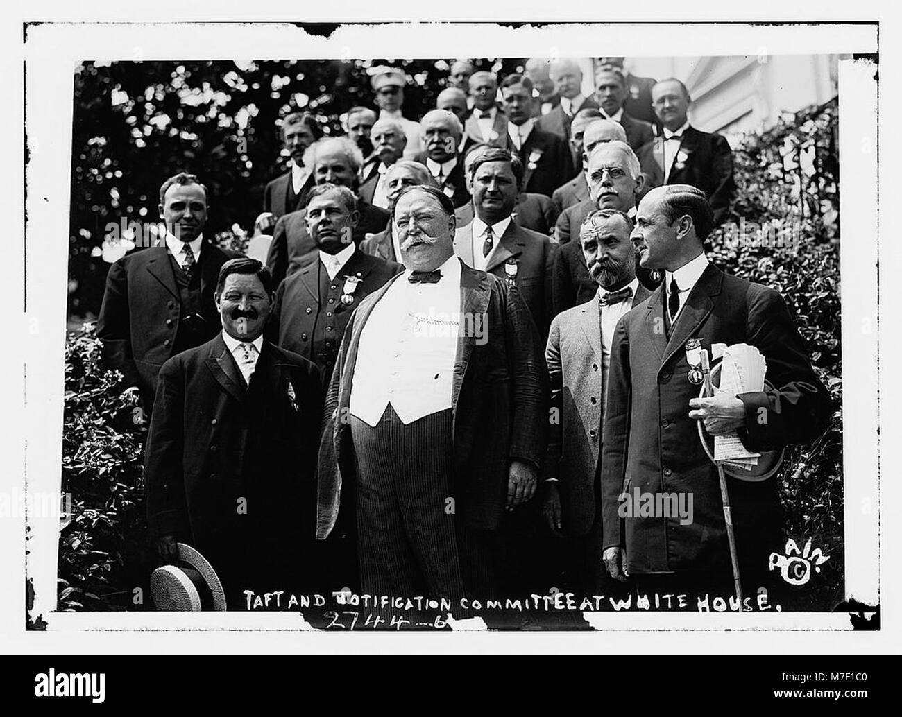 A photograph of President William H. Taft meeting with the Notification ...