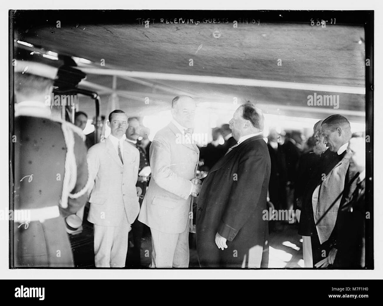 A photograph of President William Howard Taft welcoming guests aboard ...