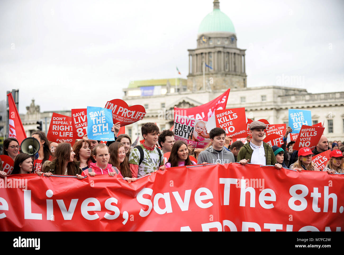 Anti-abortion protesters march through Dublin to campaign for the Eighth Amendment of the constitution to be retained in this summer's referendum. Stock Photo