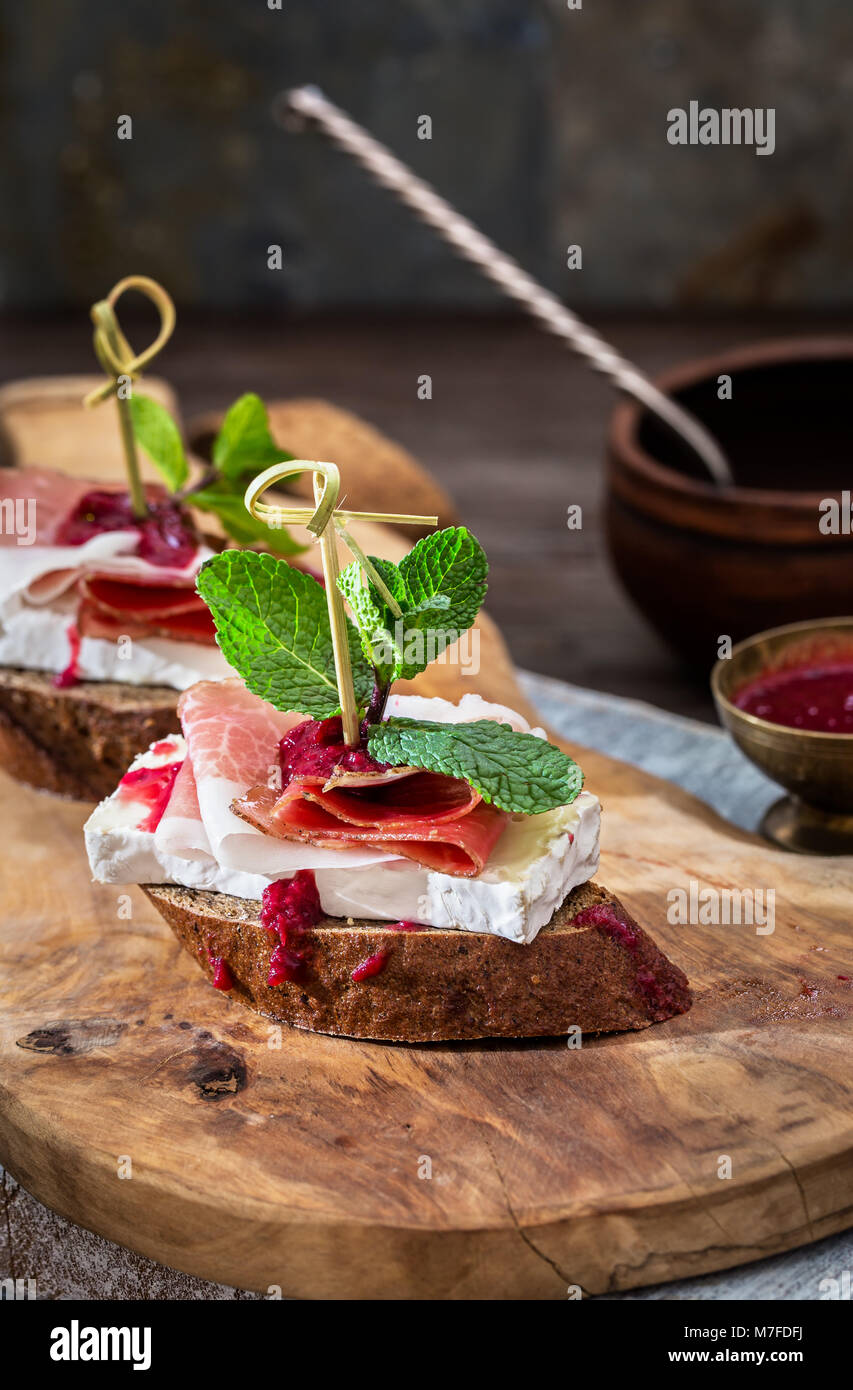 Brie and prosciutto appetizers Stock Photo Alamy