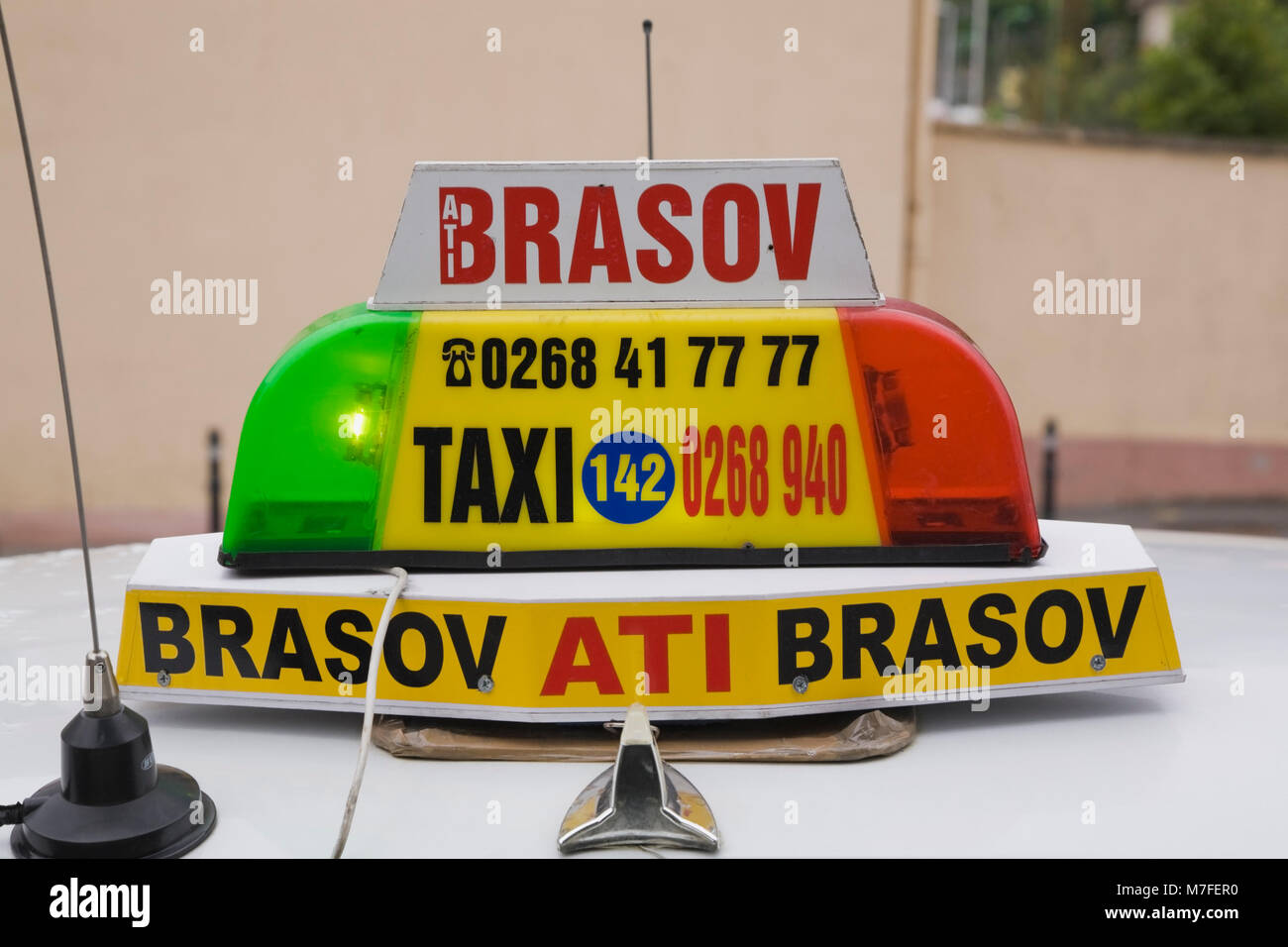 Close-up of a taxi dome sign in the town of Brasov, Romania, Eastern Europe. Stock Photo