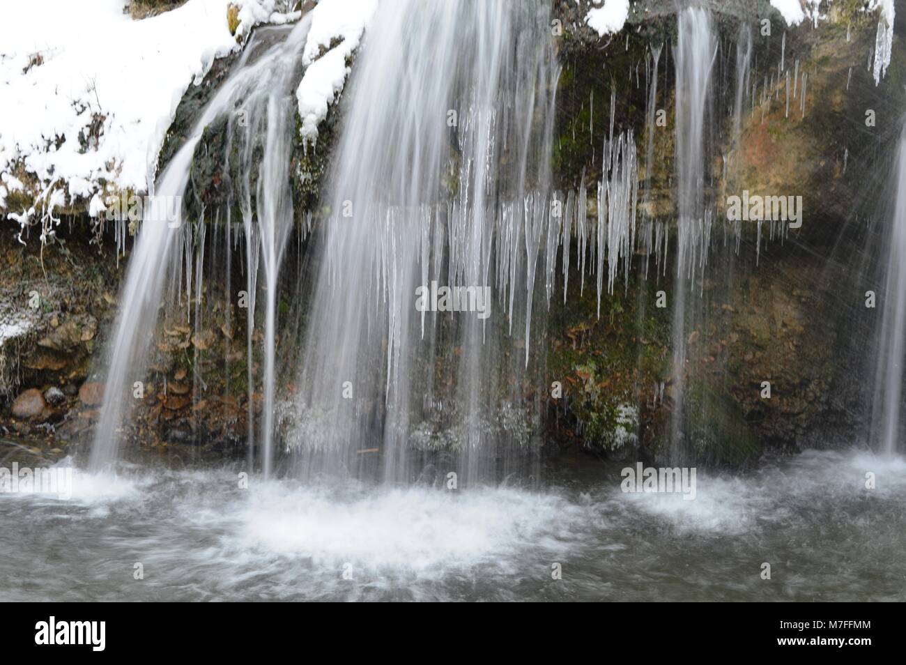 winter landscape of waterfall on the river Stock Photo - Alamy