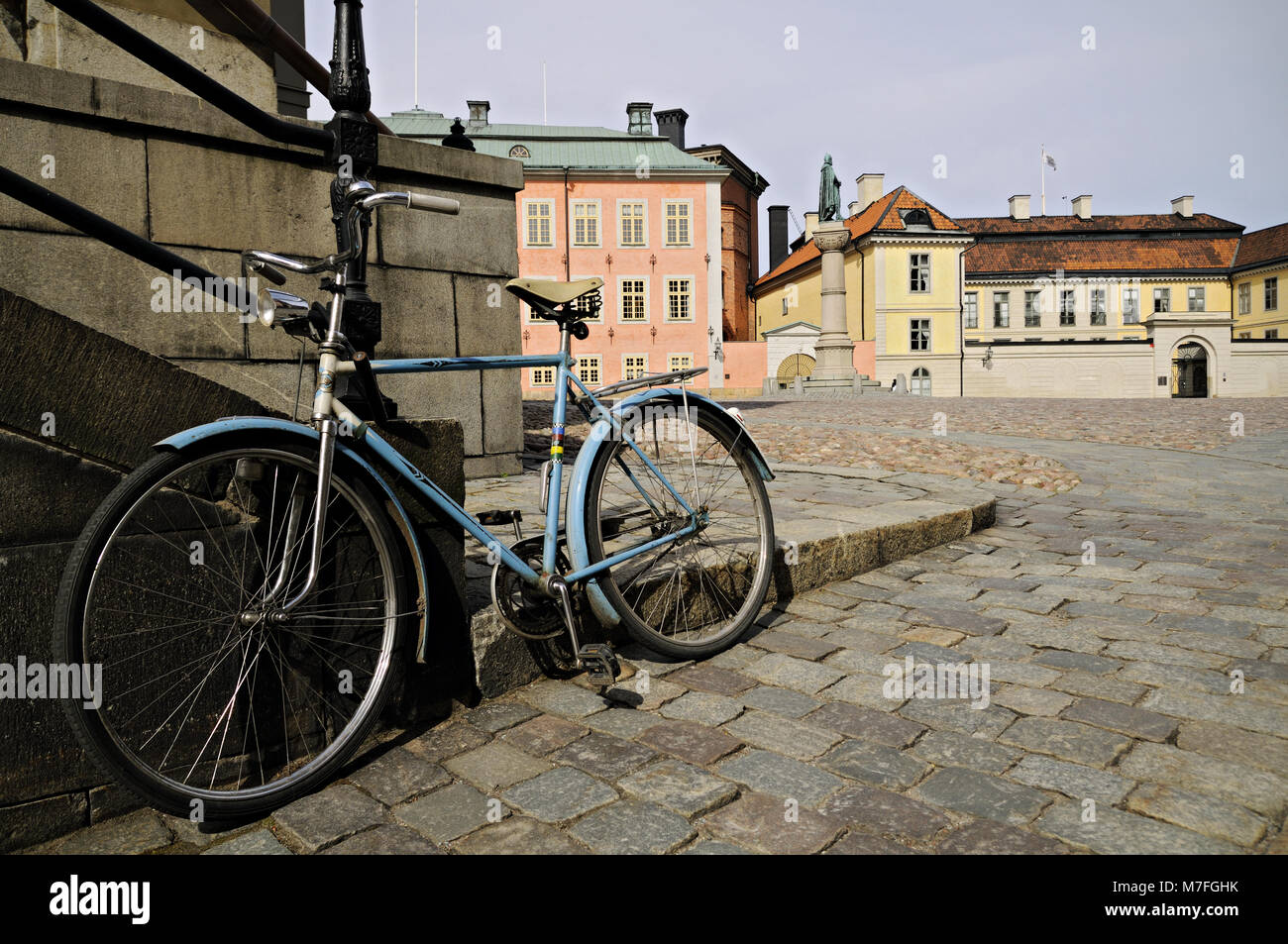 Old blue bicycle parked in Riddarholmen, Gamla Stan, Stockholm, Sweden Stock Photo