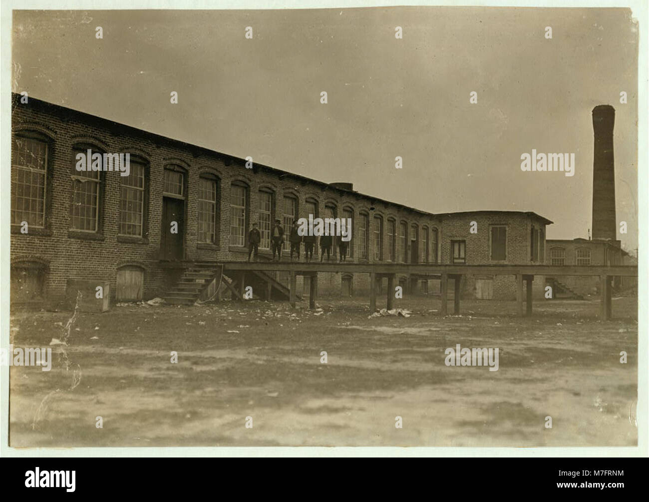 View of Scotland Mills, Laurinburg, N.C. All these boys work in mill. Sunday, Dec. 6-08. Witness, Sara R. Hine. LOC nclc.01512 Stock Photo