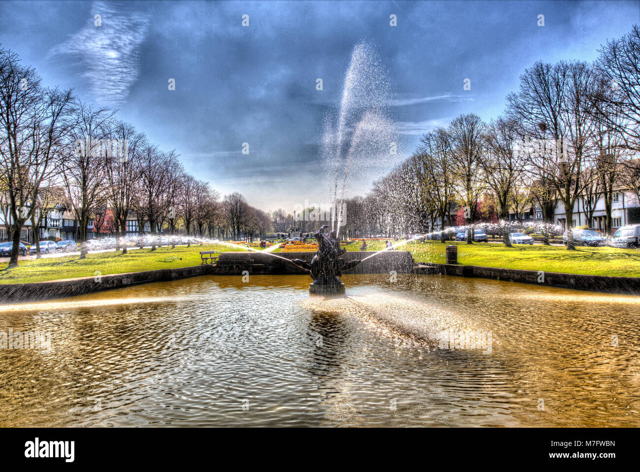Village of Port Sunlight, England. Artistic view of the Sir Charles Thomas Wheeler sculpted water fountain. Stock Photo