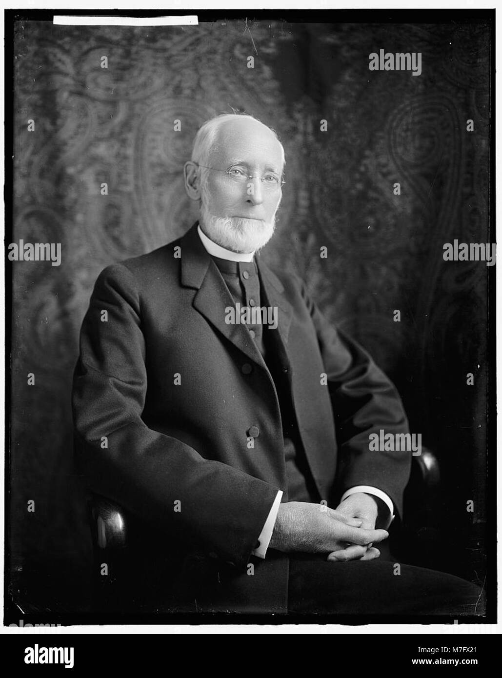 A portrait of O.W. Whitaker, a bishop, likely captured in a formal or ...