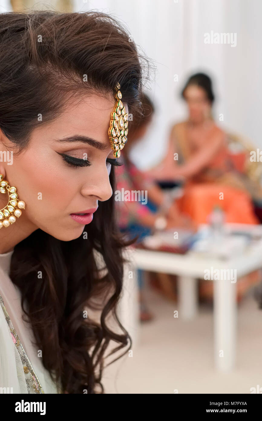 Portrait Of Bride Preparing For Indian Sikh Wedding Stock Photo