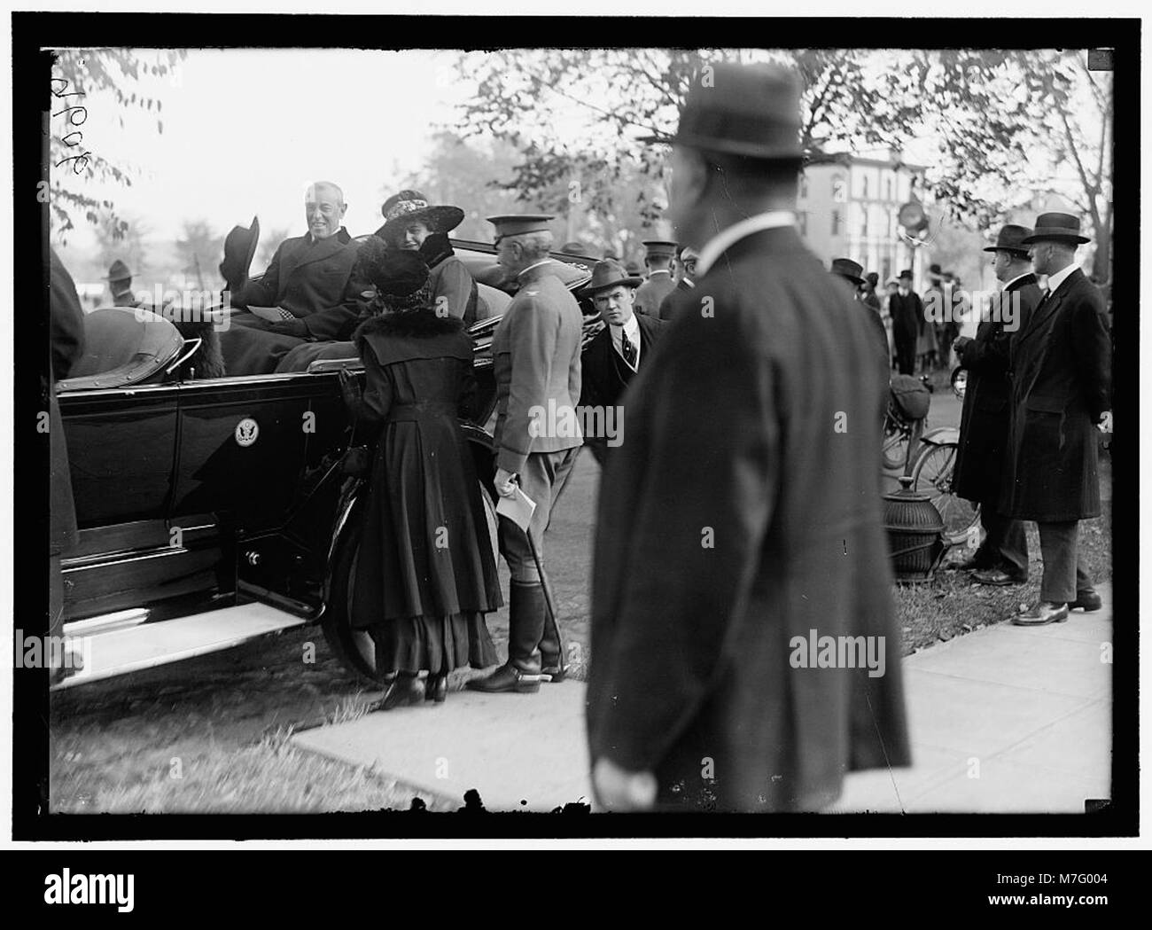 Woodrow Wilson and wife (Edith Bolling Wilson) in back seat of