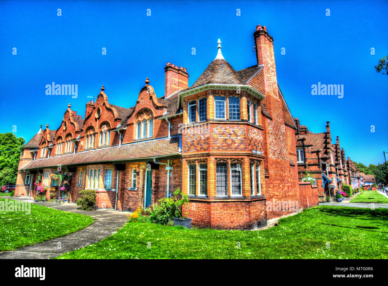 Village of Port Sunlight, England. Artistic view of Port Sunlight cottages on the junction of Bridge Street and Wood Street. Stock Photo