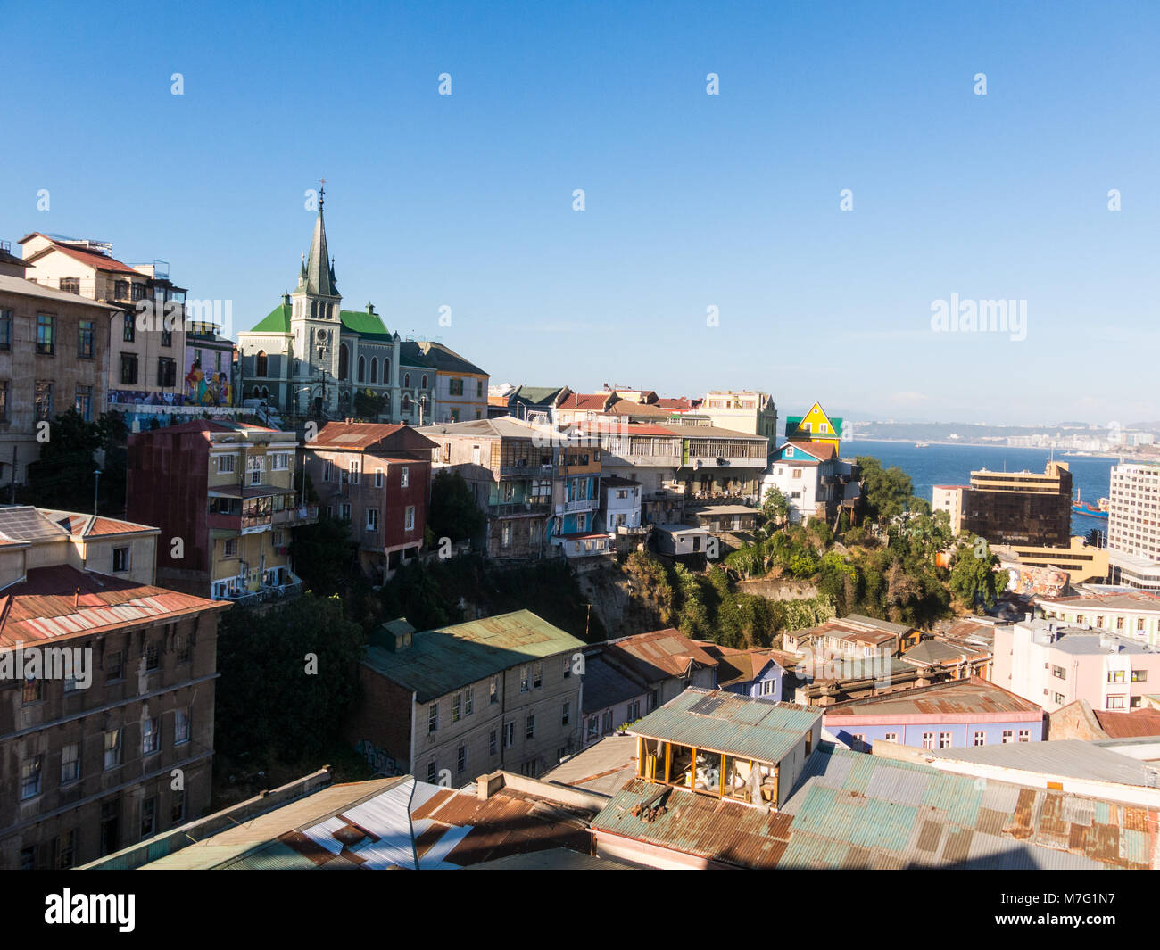 View on Cityscape of historical city Valparaiso, Chile. The colorful houses and hectic street in Valparaiso. It is the most important seaport in Chile Stock Photo