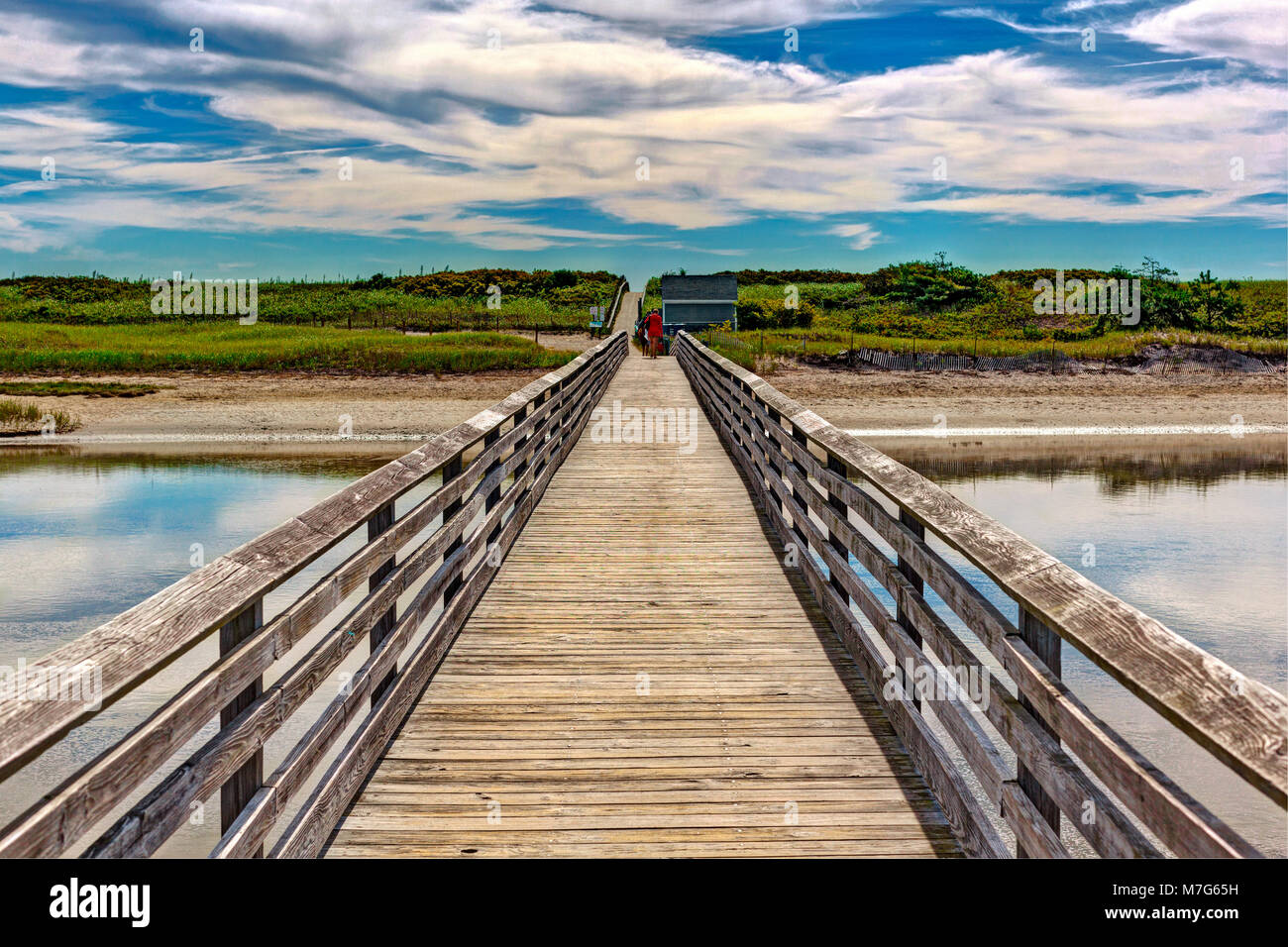 The footbridge crossing the river leading to the beach at Ogunquit, Maine. Stock Photo