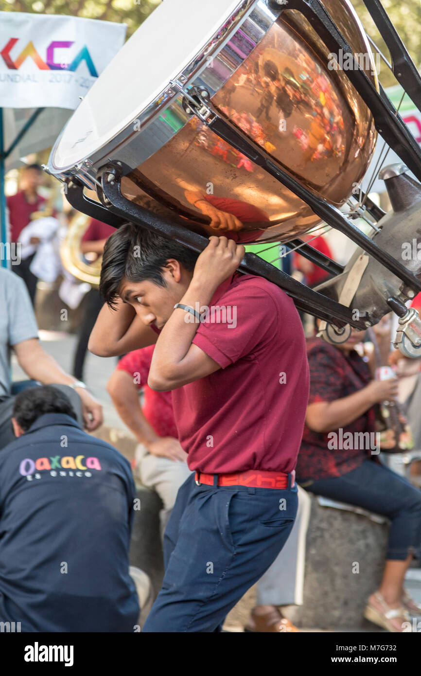 Oaxaca, Oaxaca, Mexico - A young man carries a drum for a performance during the DÃ­a Internacional de la Lengua Materna, or the International Day of  Stock Photo