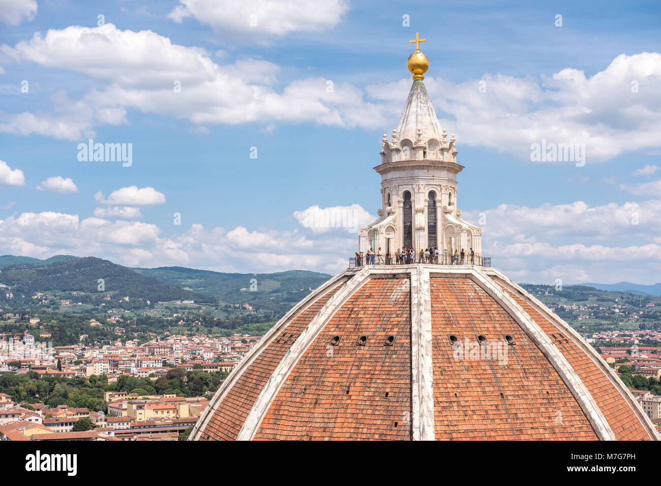 Aerial view of Florence. With Unidentified people on top of Florence Duomo Cathedral. Stock Photo