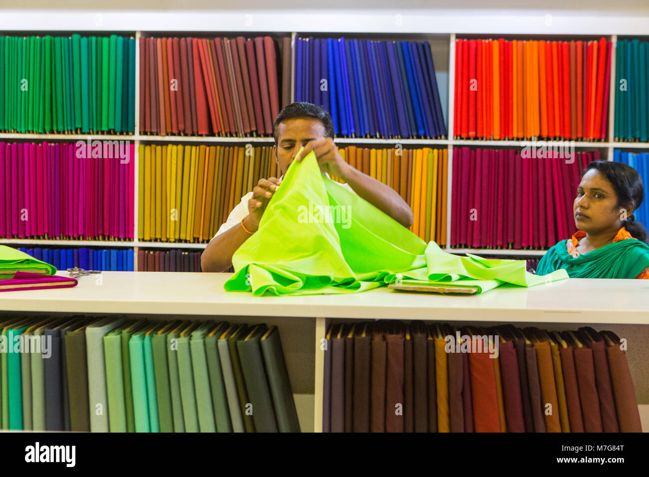 shopping for colourful materials at pothys in trivandrum Stock Photo