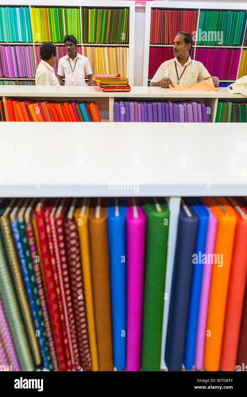 shopping for colourful materials at pothys in trivandrum Stock Photo