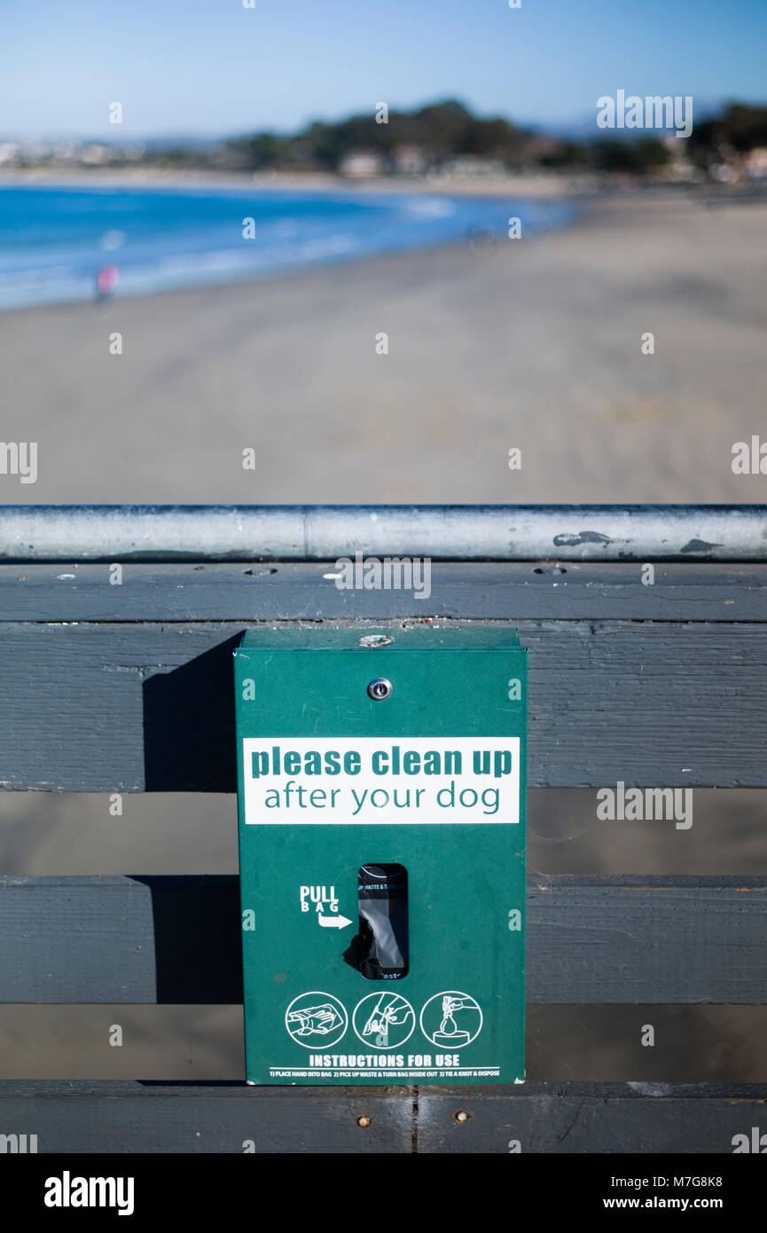 Dog waste bag dispenser Municipal Wharf Monterey California USA Stock Photo