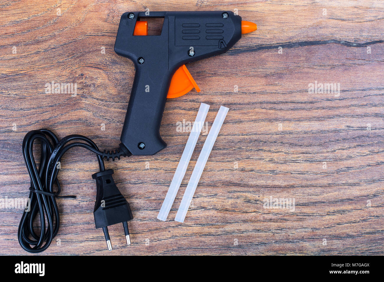 Hotmelt gun, construction tools Stock Photo Alamy
