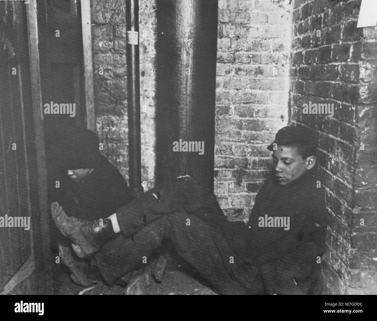 This photograph by Jacob A. Riis shows the press room of the *Sun ...