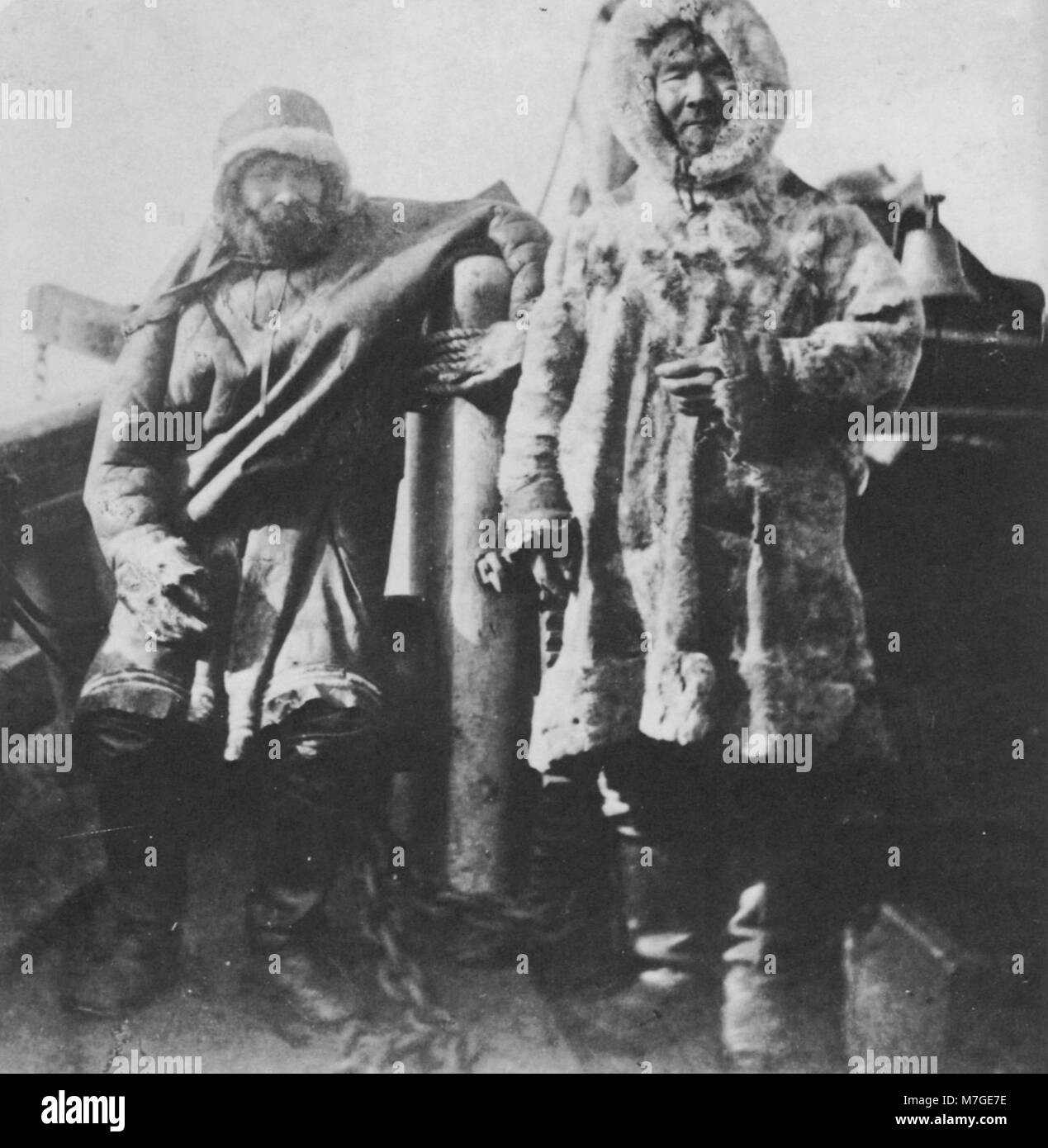 This Russian photograph depicts Russian and Samoyedic leaders traveling to the Pechora River mouth, capturing a moment of cross-cultural interaction and historical travel during the early 20th century. Stock Photo