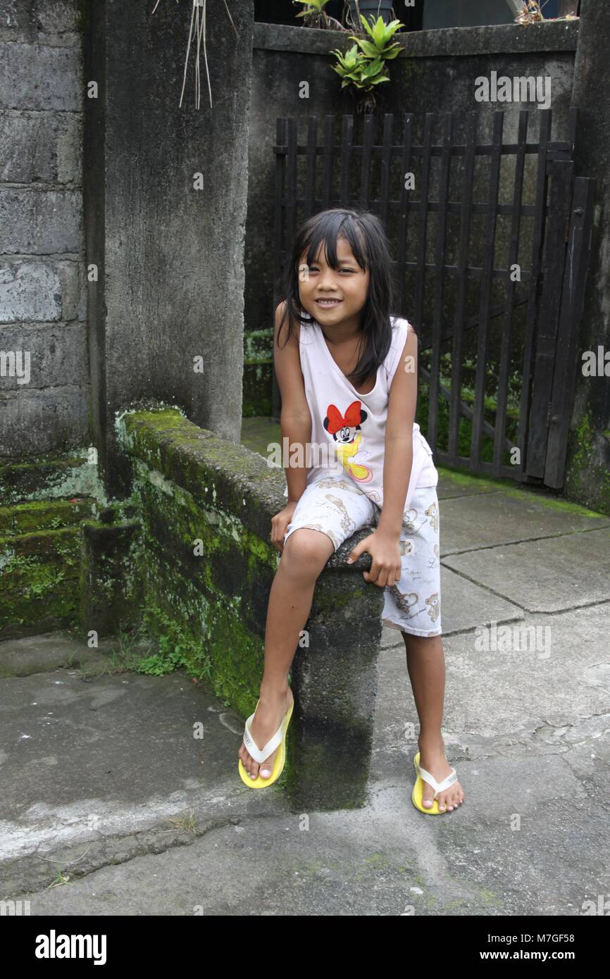 Cute little girl on the street Stock Photo - Alamy