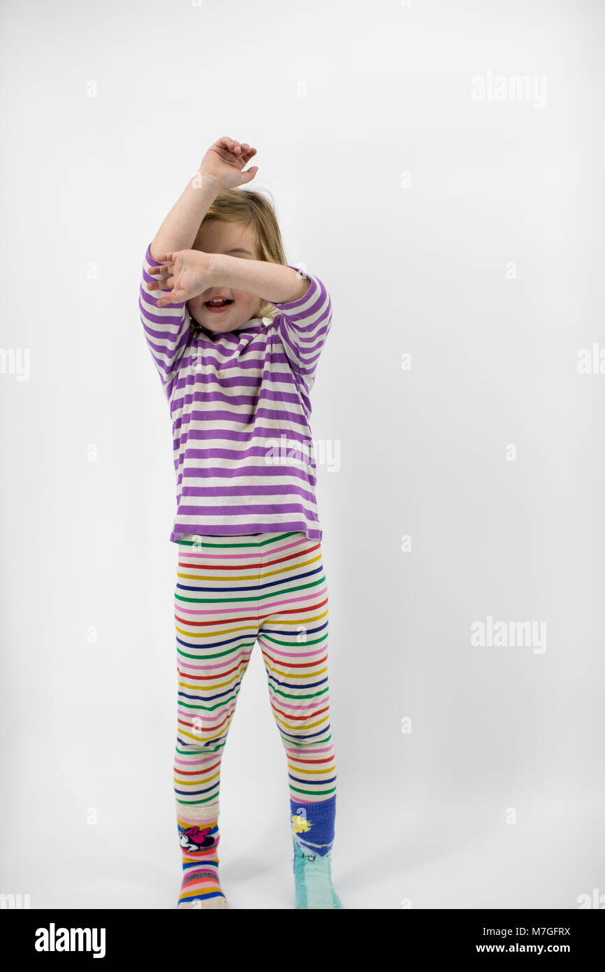 Toddler wearing mismatched clothes Stock Photo Alamy